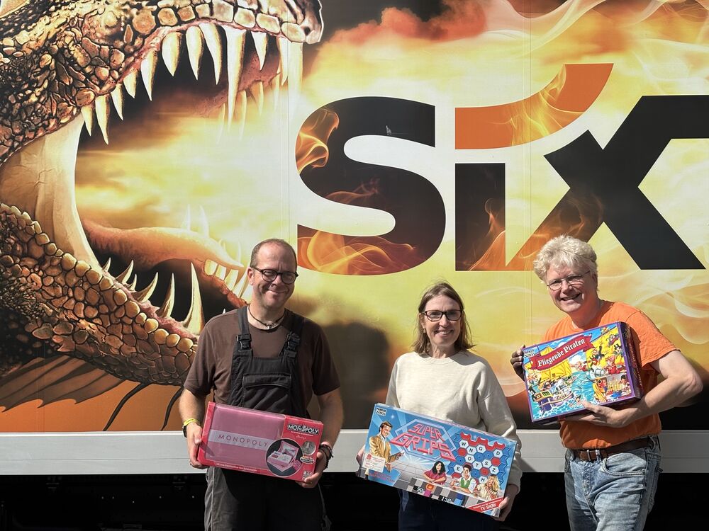 Hasbro: André Vonhof und Karla von Wedl mit Jens Junge Hasbro: André Vonhof und Karla von Wedl mit Jens Junge
